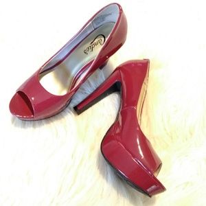 Red peep toe pumps. Candie's